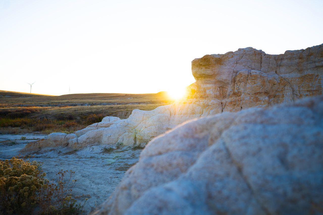 ROCK FORMATIONS AGAINST SKY