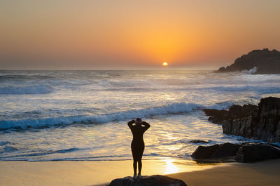 Scenic view of sea against sky during sunset