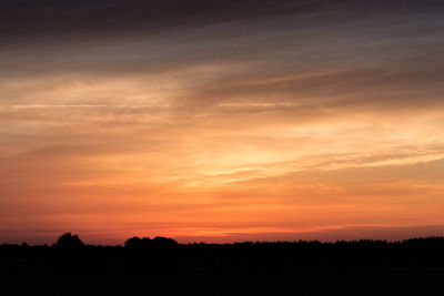 Scenic view of silhouette landscape against sky during sunset