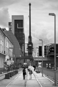City street against cloudy sky