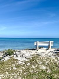 Scenic view of sea against blue sky