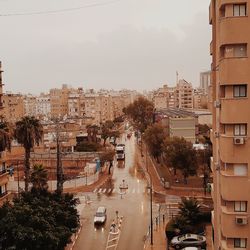 High angle view of street amidst buildings in city