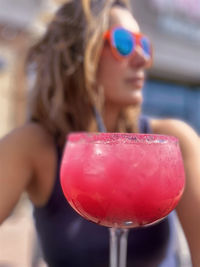 Close-up of woman holding drink