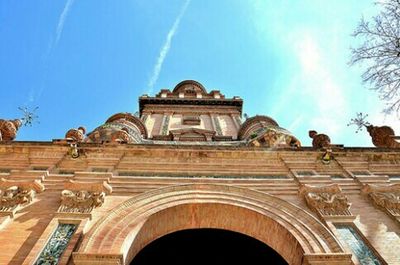 Low angle view of building against blue sky