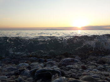 Scenic view of sea against sky during sunset