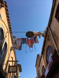Low angle view of buildings against clear sky