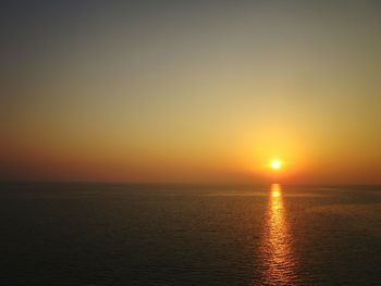 View of calm sea at sunset