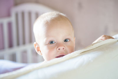 Portrait of cute baby girl at home