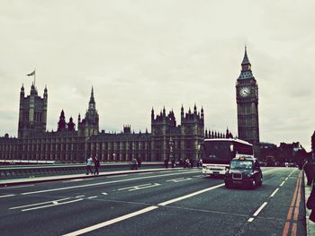 View of road with big ben against the sky