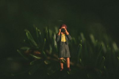 Close-up of woman standing in pond