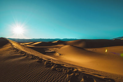 Scenic view of desert against sky