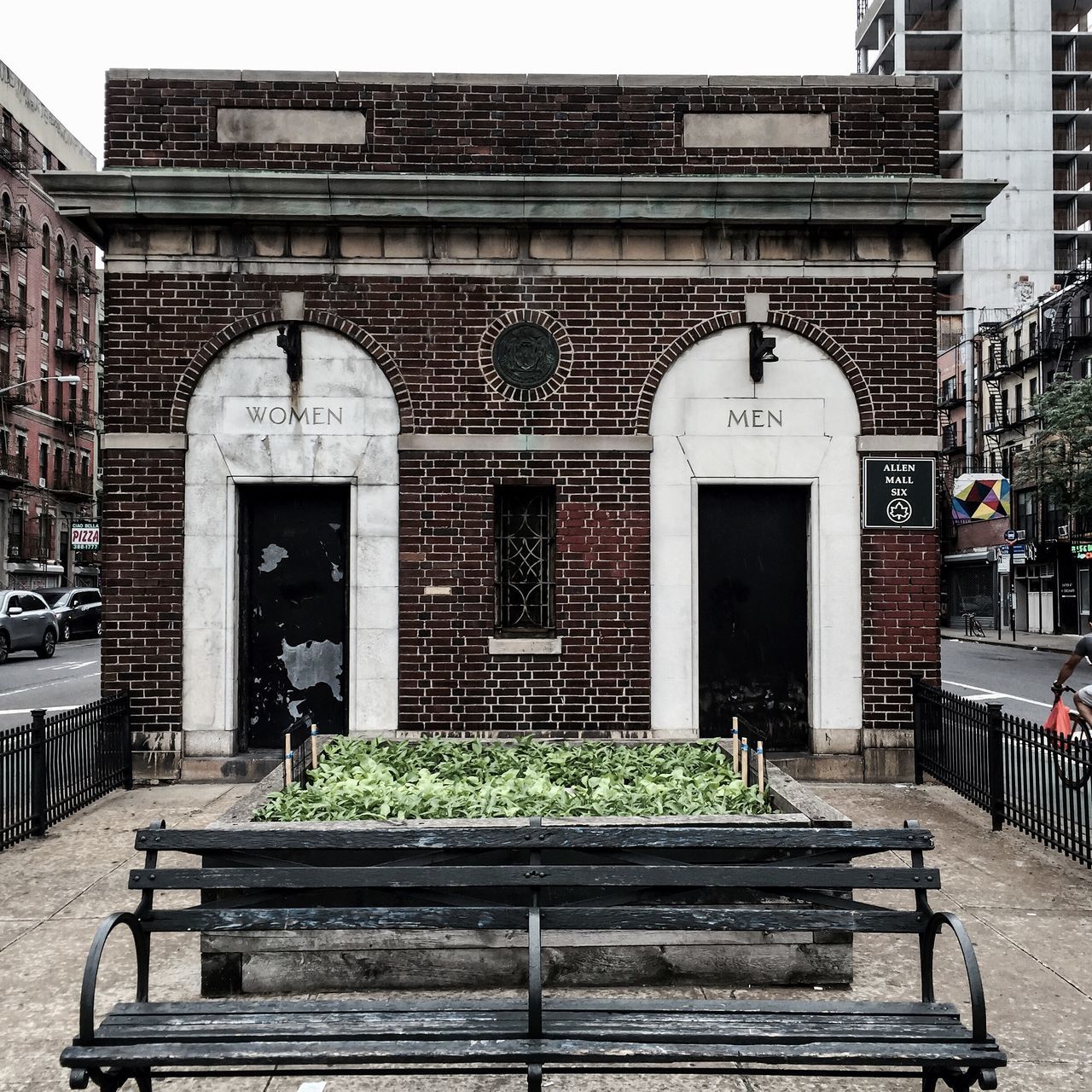 building exterior, architecture, built structure, window, city, railing, building, residential structure, day, residential building, facade, outdoors, text, house, entrance, door, gate, closed, no people, sidewalk