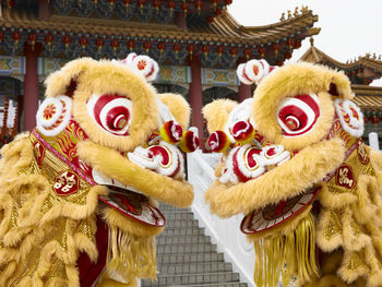 Close-up of people wearing costumes during chinese festival