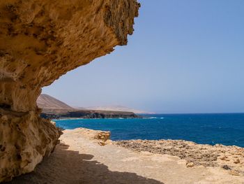 Scenic view of sea against clear sky