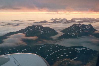 Scenic view of mountains against sky during sunset