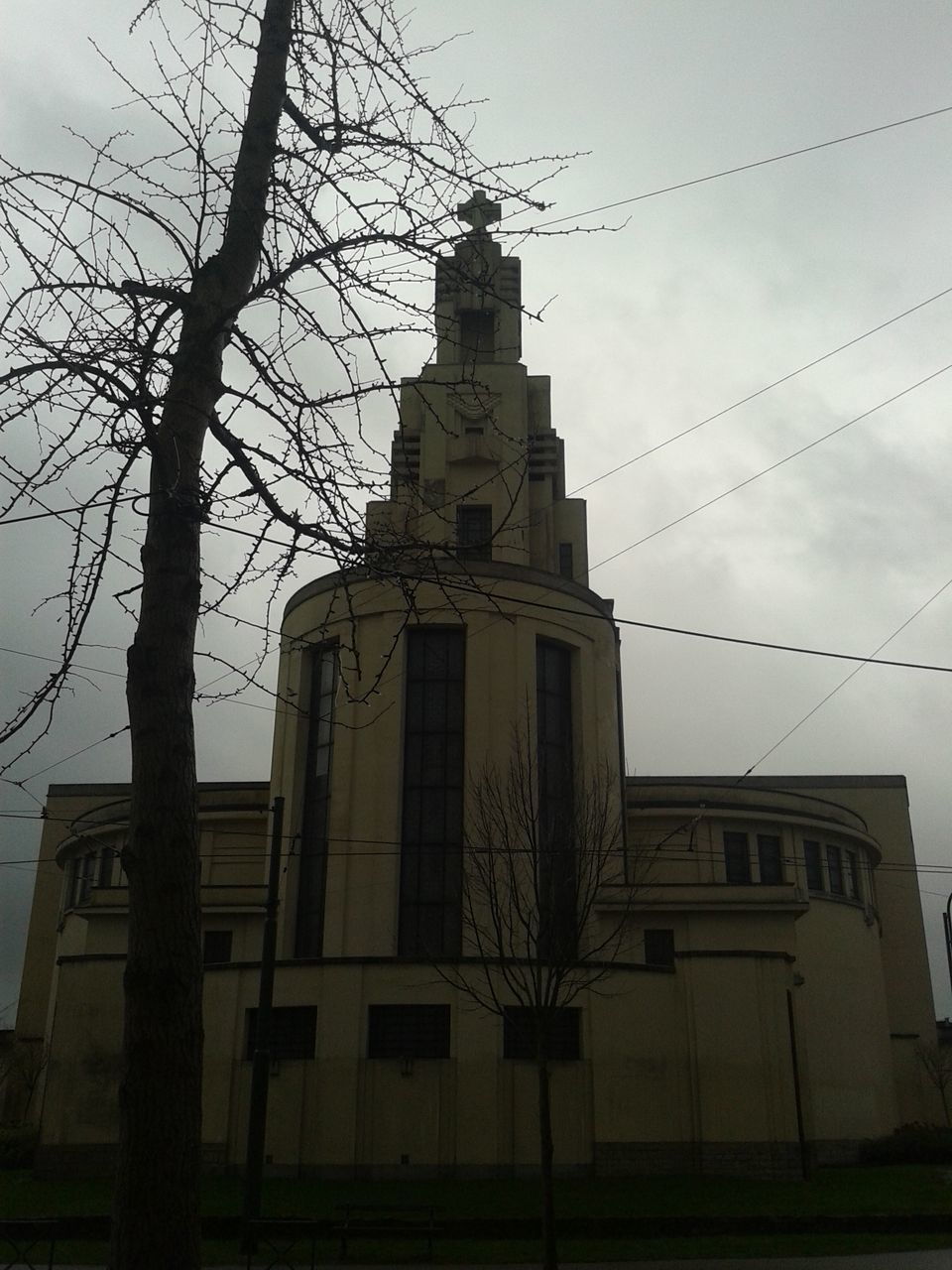 building exterior, architecture, built structure, sky, low angle view, building, city, outdoors, residential structure, residential building, day, no people, tower, cloud - sky, house, old, exterior, window, cloud, church