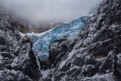 Scenic view of snowcapped mountains during winter