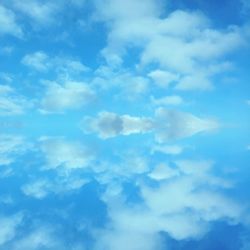 Low angle view of clouds in blue sky