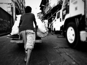 Rear view of woman on city street