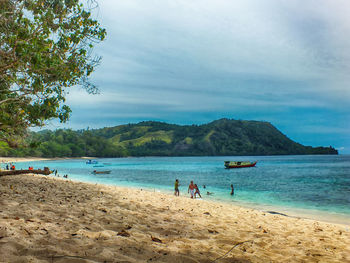 Tourists enjoying at beach