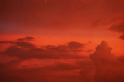 Low angle view of dramatic sky during sunset