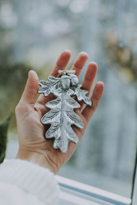 Close-up of person holding hands