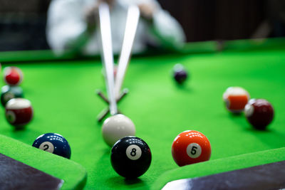 Close-up of pool balls on table