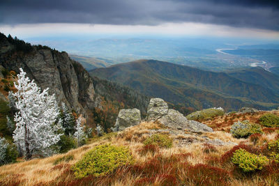 Scenic view of carpathian mountain range against cloudy sky