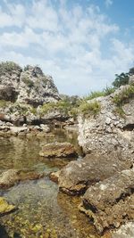 Scenic view of rock formation against sky