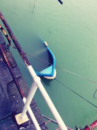 High angle view of boat moored in lake