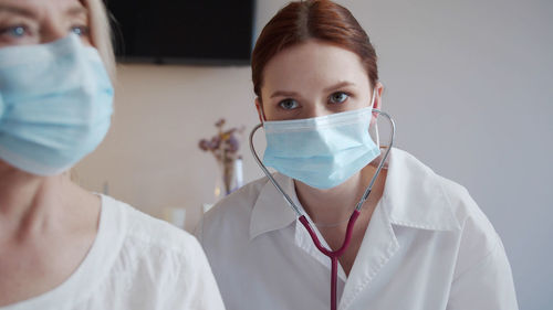 Portrait of female doctor wearing mask