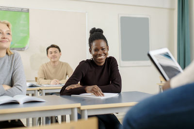 Smiling students in classroom