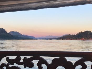 Scenic view of sea against clear sky during sunset