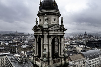 Low angle view of buildings against sky in city