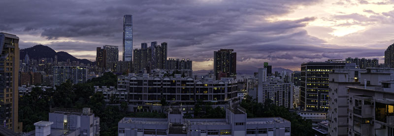 Modern buildings in city against sky