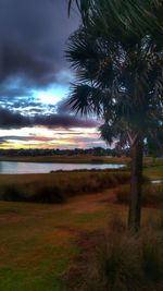 Scenic view of landscape against cloudy sky