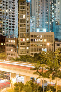 Buildings in city at night