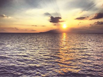 Scenic view of sea at sunset