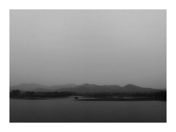 Scenic view of lake against clear sky