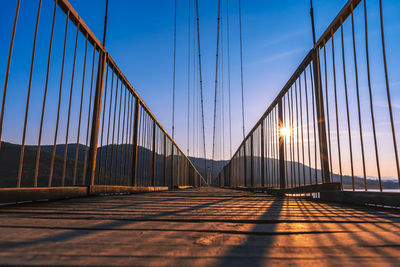 View of suspension bridge against sky