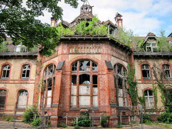 Low angle view of old building against sky