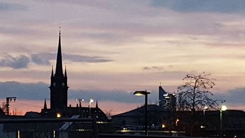 Cityscape against sky during sunset