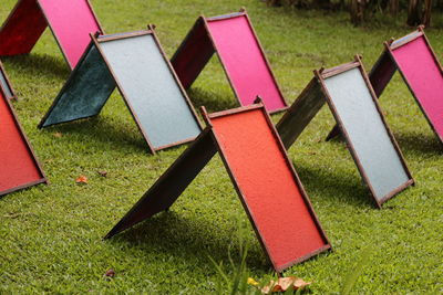 High angle view of multi colored umbrella on field