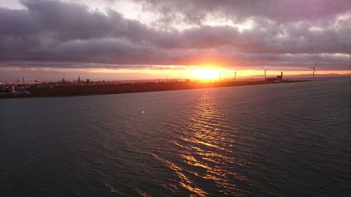 Scenic view of sea against sky during sunset