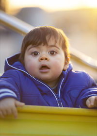 Portrait of cute boy looking away