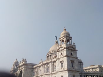 Low angle view of historic church against clear sky