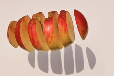 High angle view of apple on white background