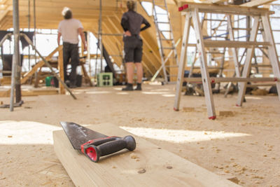 Low section of man working at construction site