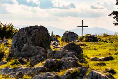 Rocks on land against sky