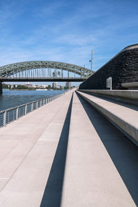 Footbridge against sky